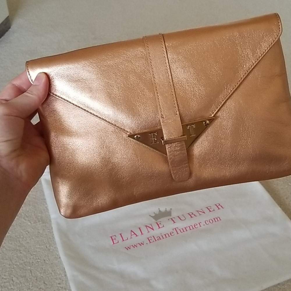 NWT Rose Gold leather clutch
